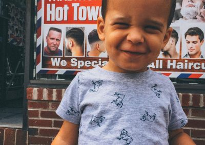 Its been a few weeks since your last haircut. You used to go to daddy's hair stylist (Lori) in Queens but since daddy's schedule at work changed we can't go there anymore. Lori only works on Saturdays. Dad found a new place in the city so mommy has a choice of either going to Queens or find someone nearby. And that's exactly what mommy did. She took you to a local neighborhood location named Jacobs Barber Shop in Bellmore. I was told that you really enjoyed the entire process of getting your haircut. You were never a problem for Lori. Everyone always wondered how well you handled getting a haircut at such a young age. So mommy dropped off Annelise at school and with Paula they took you for a much needed haircut. Upon your request you wanted Paula to sit with you as you received your knew "dew."