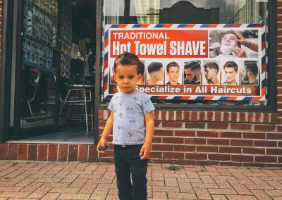 Its been a few weeks since your last haircut. You used to go to daddy's hair stylist (Lori) in Queens but since daddy's schedule at work changed we can't go there anymore. Lori only works on Saturdays. Dad found a new place in the city so mommy has a choice of either going to Queens or find someone nearby. And that's exactly what mommy did. She took you to a local neighborhood location named Jacobs Barber Shop in Bellmore. I was told that you really enjoyed the entire process of getting your haircut. You were never a problem for Lori. Everyone always wondered how well you handled getting a haircut at such a young age. So mommy dropped off Annelise at school and with Paula they took you for a much needed haircut. Upon your request you wanted Paula to sit with you as you received your knew "dew."