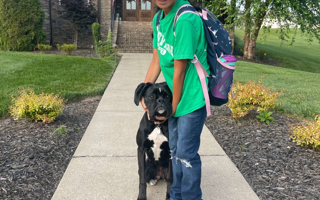 Anne & Ms. Dixie waiting on the bus..